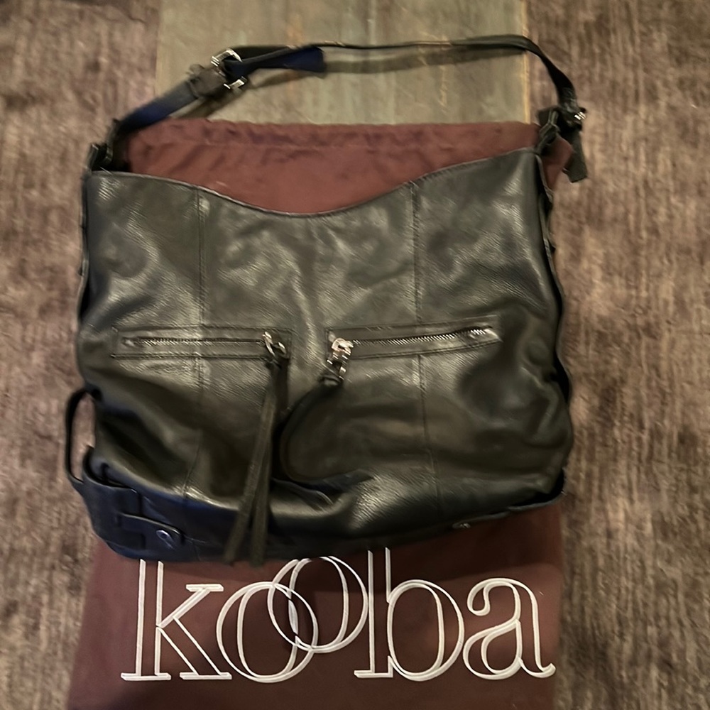 Kooba black leather shoulder bag.